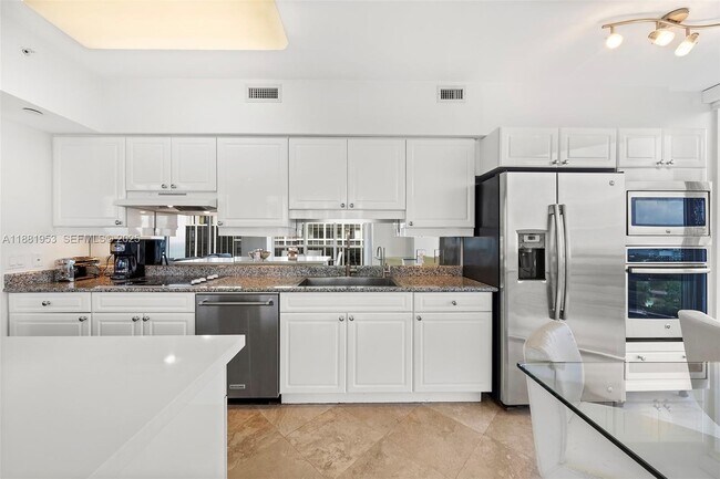 Building Photo - 4779 Collins Ave