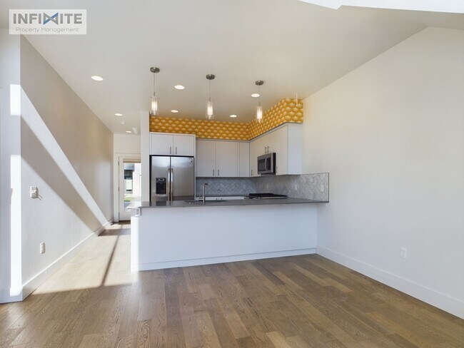 Building Photo - Natural Light Galore!