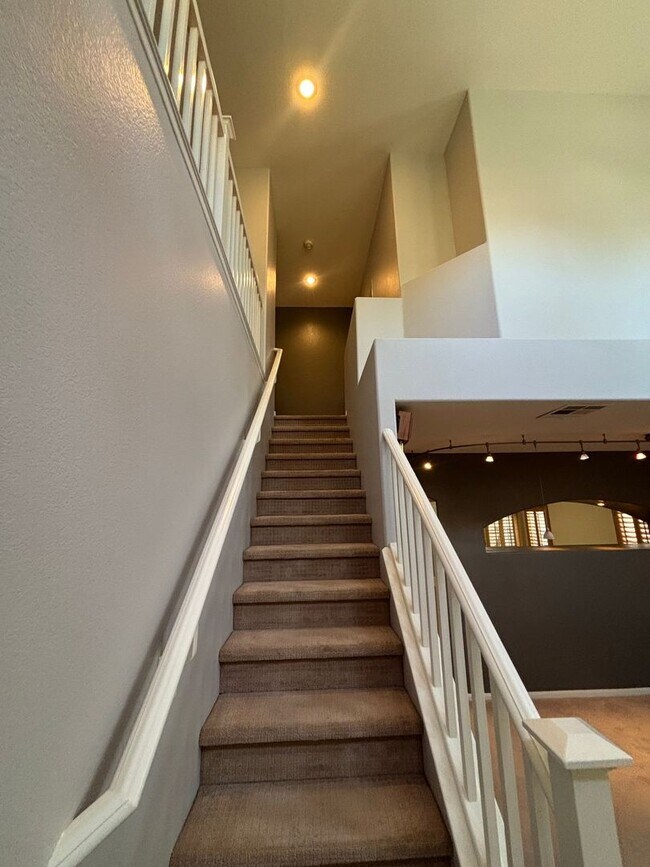 Building Photo - Gated Green Valley Ranch Townhome | 2 Bed | 2.5 Bath | 2-Car Garage