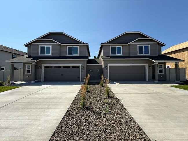 Building Photo - NEW Modern Townhouse with Two Car Garage i...