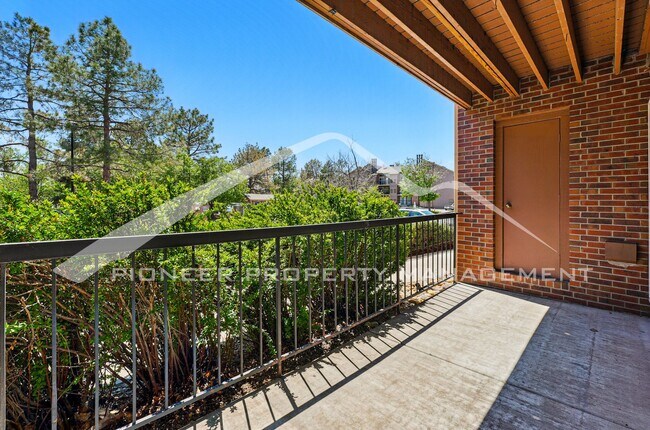 Building Photo - Charming Condo with Washer/Dryer and Patio