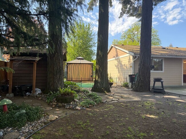 Building Photo - Beautiful 3 Bedroom Ranch Style House with 2 Car Garage, Fences Yard, Fireplace, Shed, Workshop &...