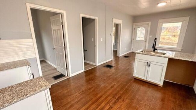 Building Photo - Spacious 3BR / 2BA Home – Private Upstairs Living Area & Fenced Backyard