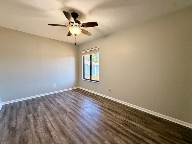 Building Photo - Light-Filled 2BR Condo in Gated Pelican Bay Near Golf, Beach & I-95