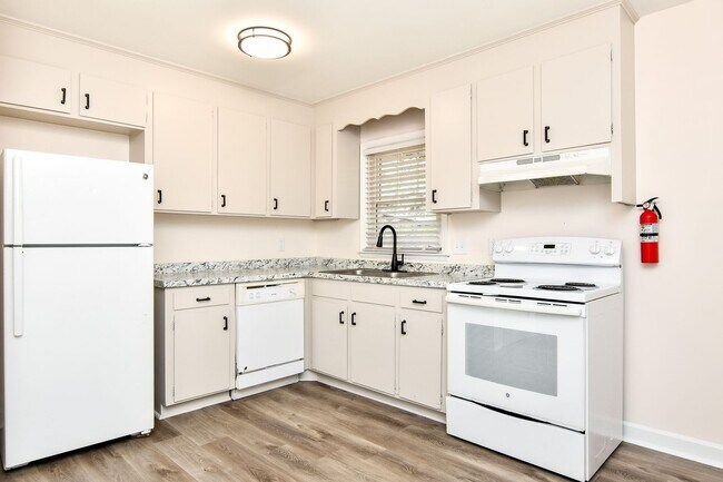 Building Photo - Tour Today! Beautiful redesigned corner co...