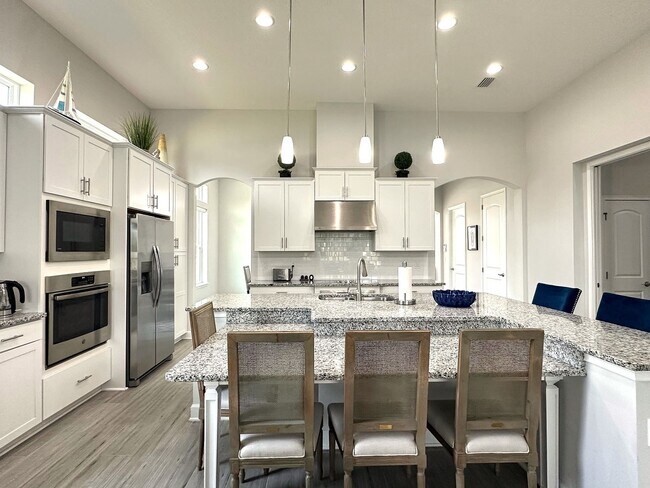 Building Photo - Stunning 4/4, Available Immediately, Fully...