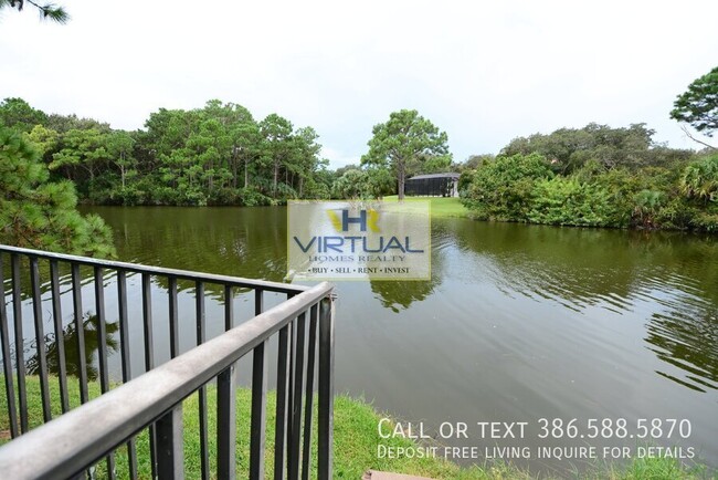 Building Photo - Lakefront pool home with scenic views loca...