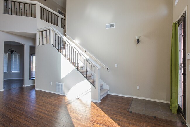 Building Photo - Beautiful 4-Bedroom Home with Custom Backy...