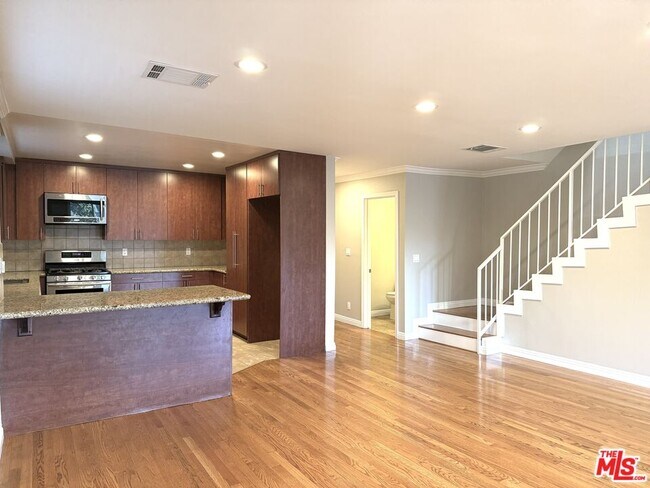 Building Photo - 310 E Providencia Ave