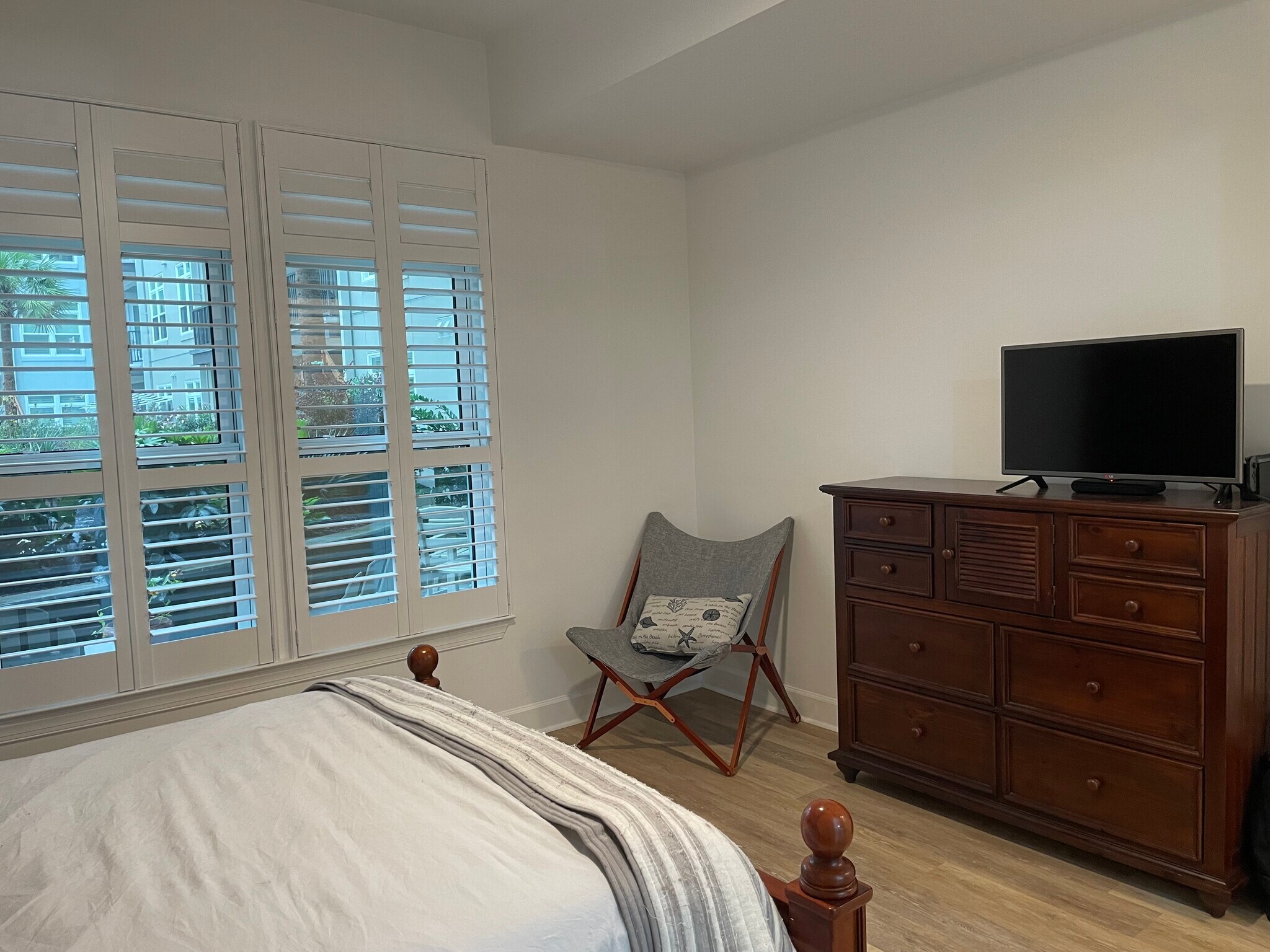 The bedroom and view of patio - 145 Pier View St