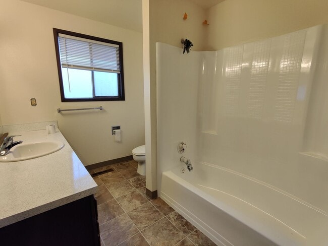 Building Photo - Duplex with garage and fenced yard and upd...