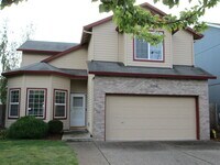 Building Photo - 3194 SE Tumblestone Dr