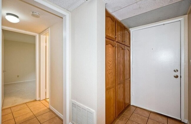 Building Photo - First-Floor 2BR Condo with Pool Access & Covered Parking in La Bonita