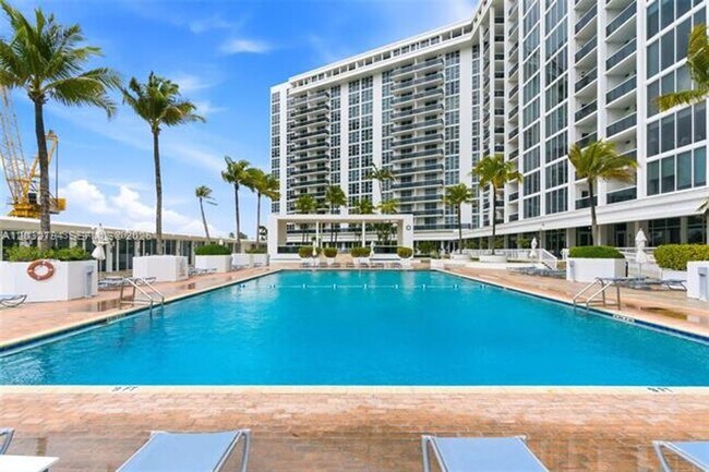 Building Photo - 10275 Collins Ave