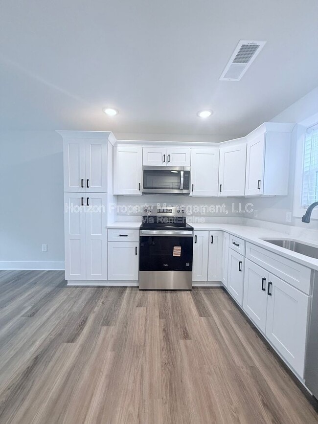 Building Photo - 7845 Wilkinson Dr