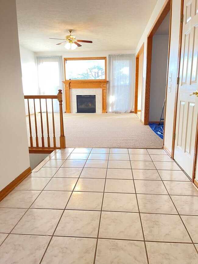 Building Photo - Northwest Omaha Gem: 2,700 Sq Ft, 3-Bedroom, Walk-Out Finished Basement, Fenced Yard, 3-Car Garag...