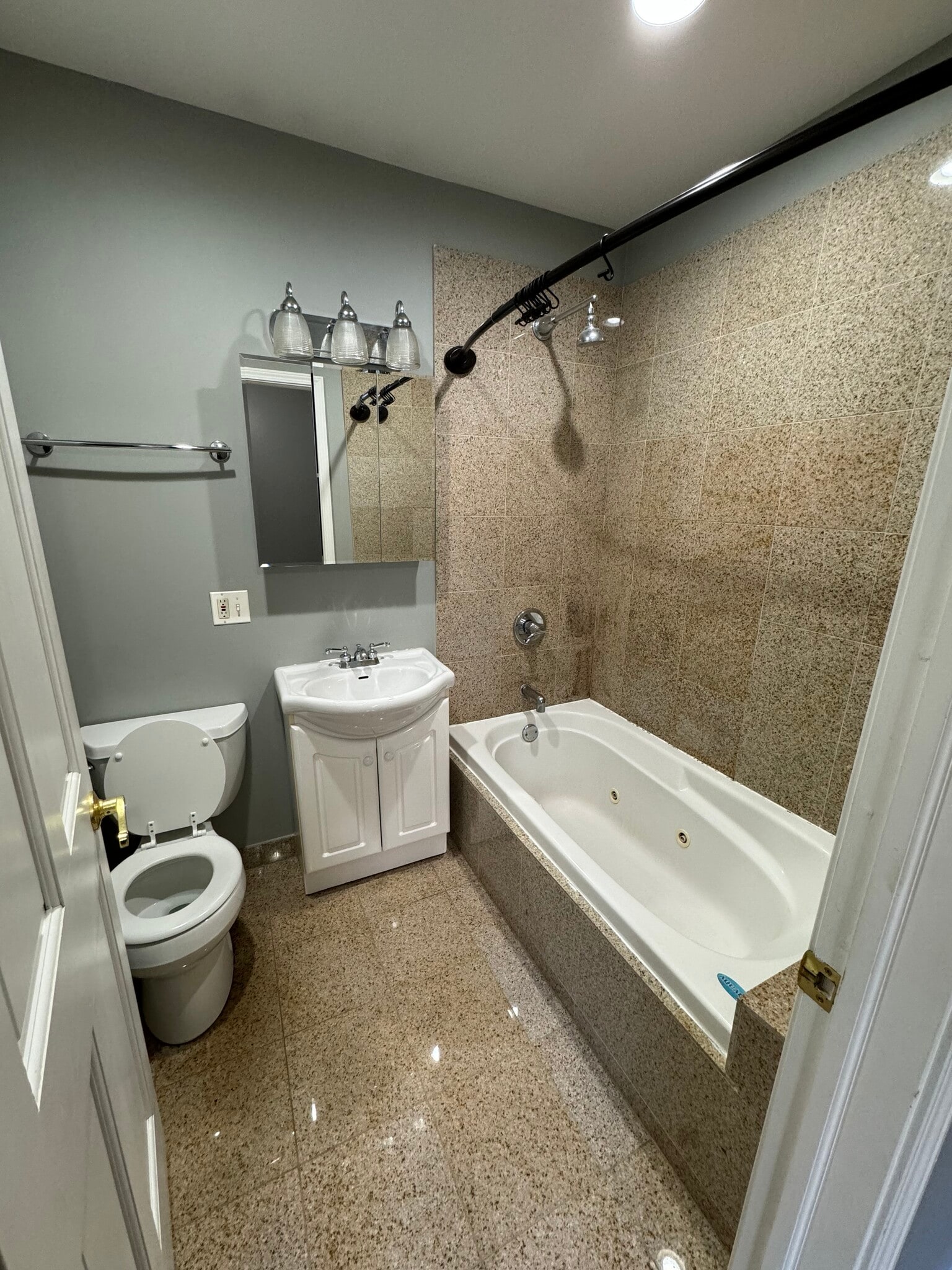 Bathroom attached to primary bedroom - 1906 W Estes Ave