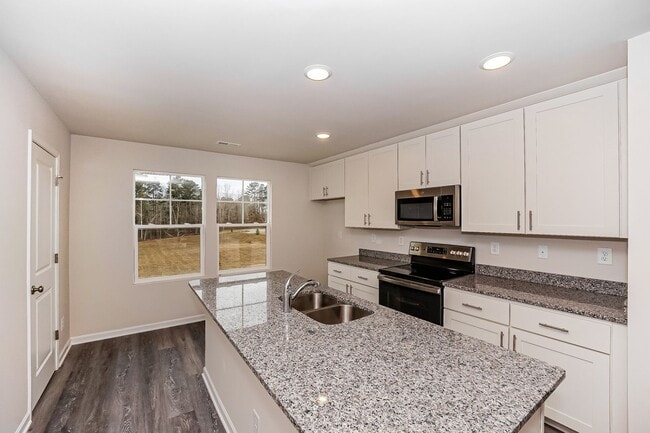 Building Photo - FIRST MONTH FREE -  3BR/3.5BA brand new townhome with 1-car garage near Downtown Mooresville.