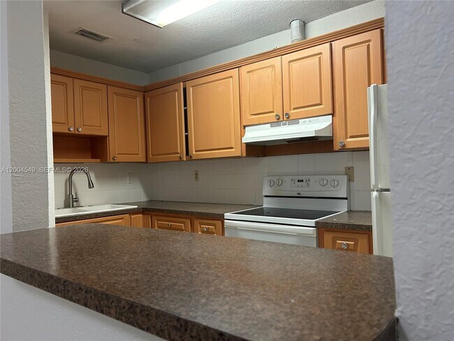 Building Photo - 12960 SW 66th Ln