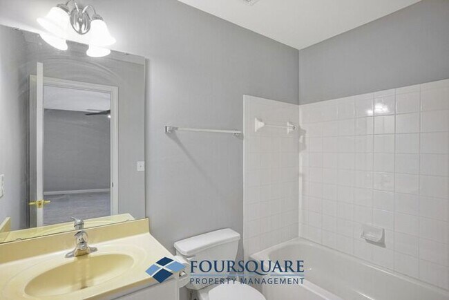Building Photo - Lakefront Townhome with 1st Floor Bedroom, Fireplace & 2-Car Garage – In Raleigh
