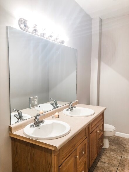 Double vanity bathroom - 102 East Cedar St.