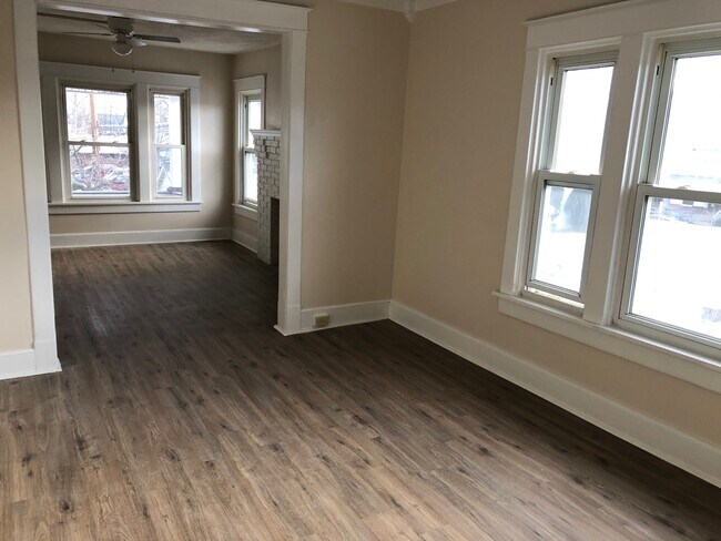 View of dining room and living room from kitchen - 871 26th St