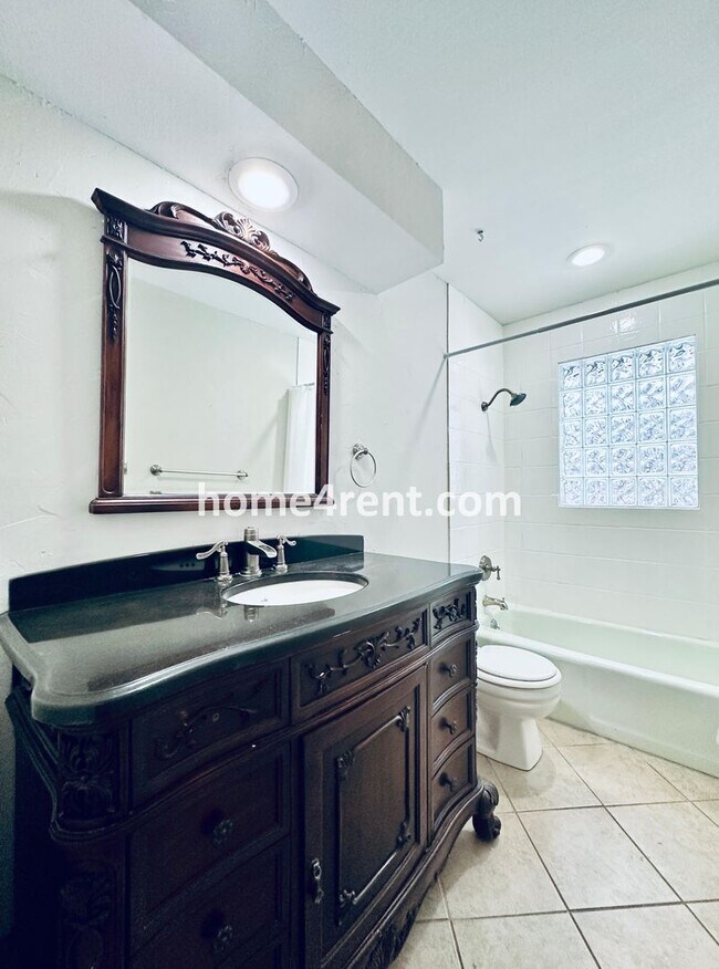 Building Photo - A Lovely Four Bedroom Home in Lenexa w/ Wood Floors, Finished Basement and a Fenced Yard!