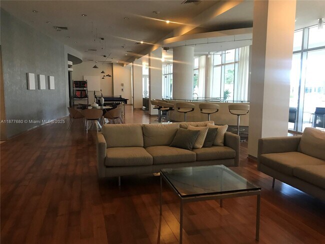 Building Photo - 10275 Collins Ave