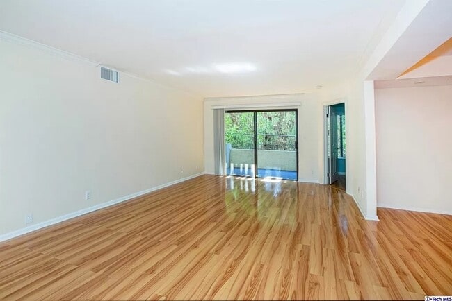 Building Photo - 5009 Woodman Ave