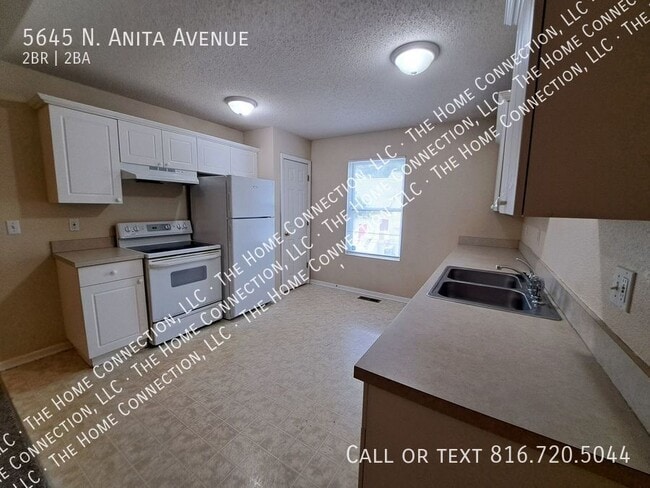 Building Photo - 5645 N Anita Ave