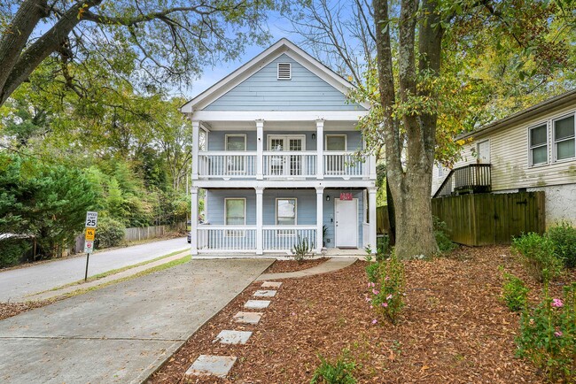 Inviting front of the home with well-maintained landscaping and a welcoming entrance - 247 Farrington Ave SE