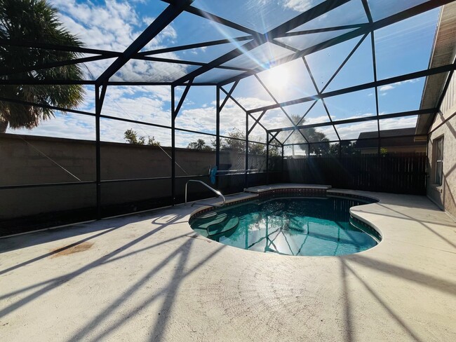 Building Photo - 2/2 POOL HOME with 2 Car Garage located in...