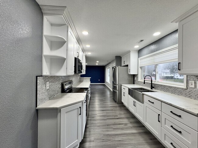 Building Photo - Fully-Updated 1st-Time Rental! Ready NOW! Pet Friendly w/Large, Detached Garage Workshop!