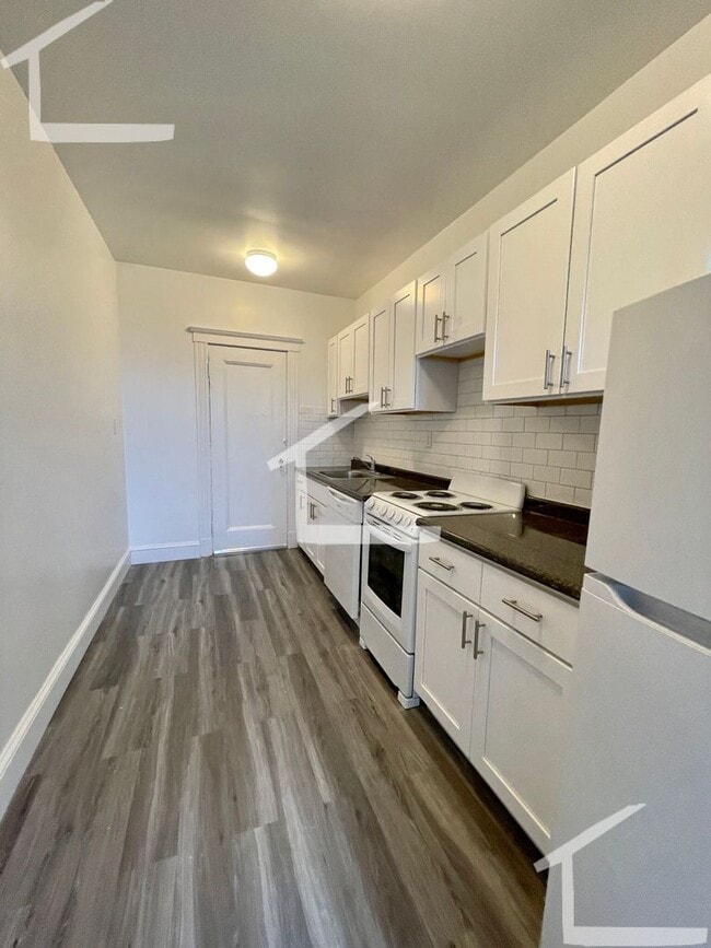 Building Photo - No Brokers Fee, No Security Deposit, Heat, Hot Water Included, Laundry on a Site