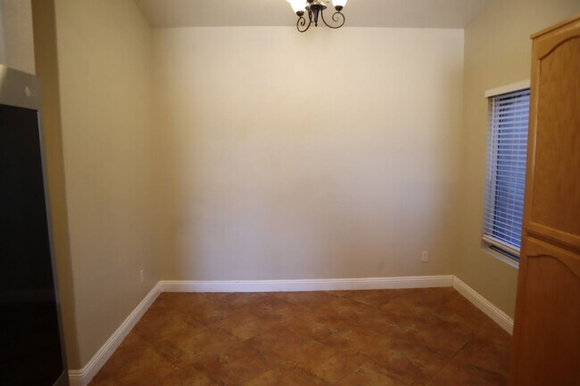 Building Photo - Home With A Pool and Much More!