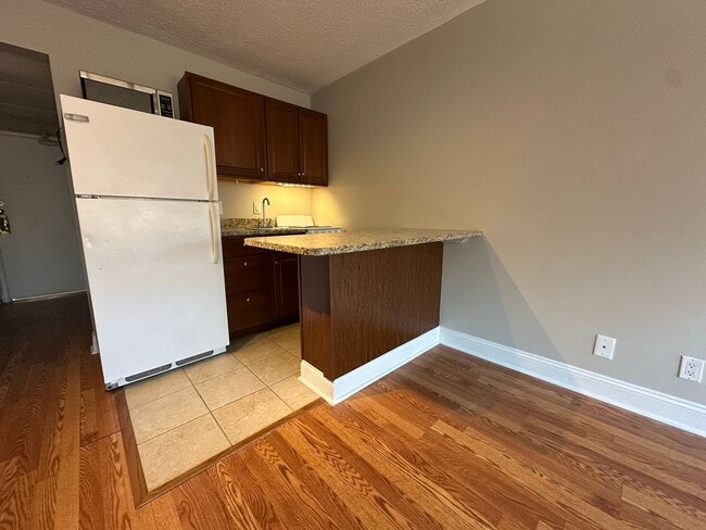 Building Photo - University Towers- Studio Apartment #418 Available NOW for short or long term lease @ $1100/month
