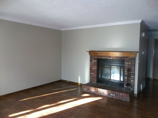 Building Photo - $500 OFF First Month | Charming 2BR Townhome with Garage