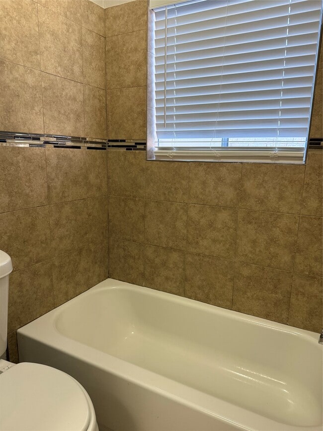 Building Photo - 6573 S Briar Bayou Dr