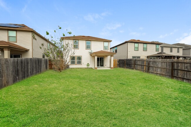 Building Photo - 2 Story Home with a HUGE backyard, covered...