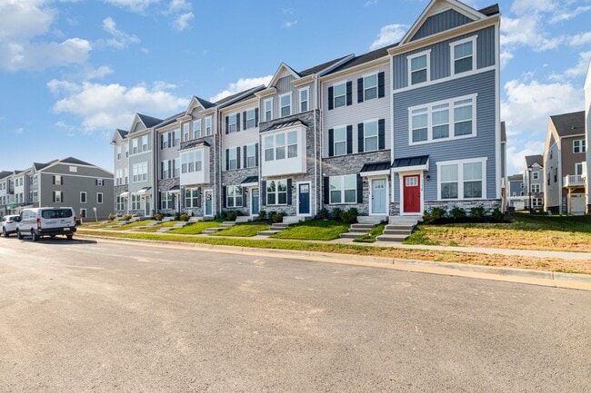 Building Photo - New Construction 3 Bedroom Townhome in Fre...