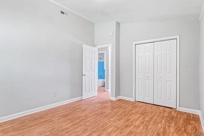 Building Photo - NE – Desirable Neighborhood, Brick Home, Wood/Laminate Flooring, Vaulted Ceilings, Carport, Fenced!