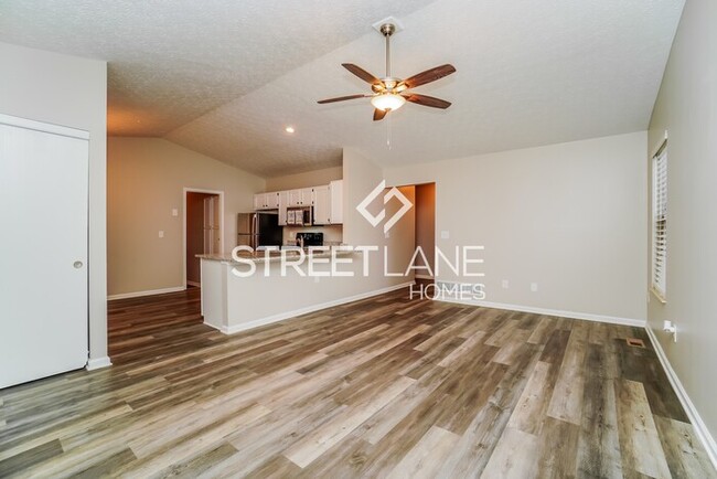Building Photo - REDUCED- Now offering $1000 off first full...