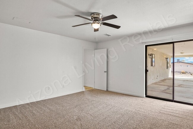 Building Photo - 2699 Smoketree Ave N