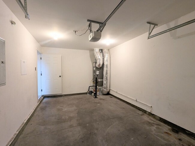 Building Photo - Gorgeous 3x2 townhouse, single-car garage, and two gas fireplaces