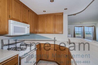 Building Photo - 2BR / 2.5 BA 1314 SQFT TOWNHOME RANCHO DEL...