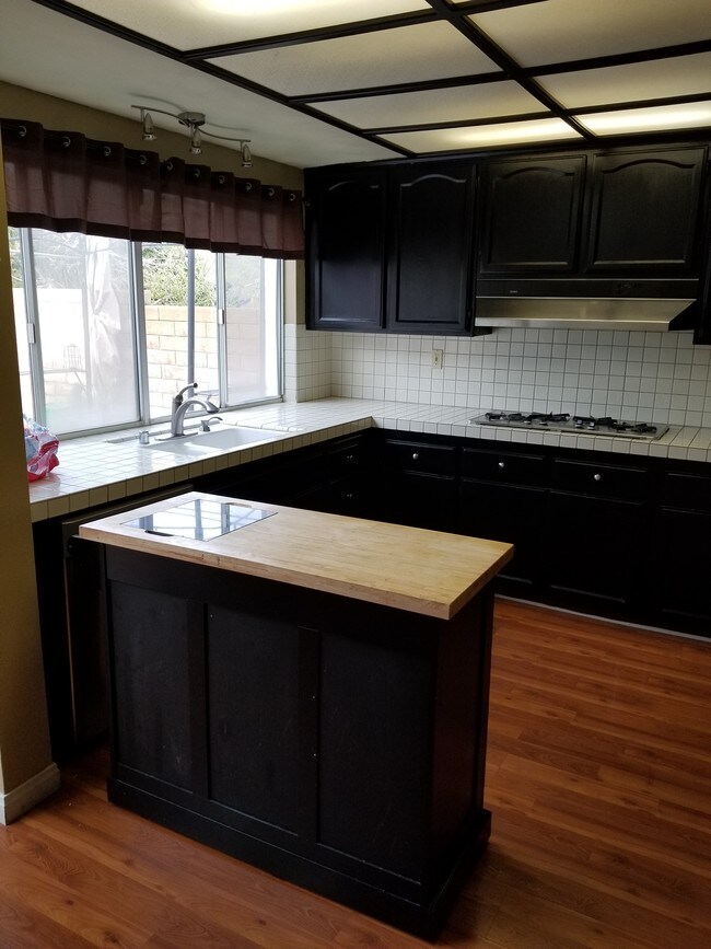 kitchen with stove top burners - 19945 Eagle Ridge Ln