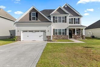 Building Photo - Reduced AND $500 OFF Move in Special! 5 bedroom Home
