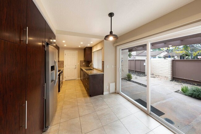 Building Photo - Fully renovated 2 bedroom 2 car garage Townhome