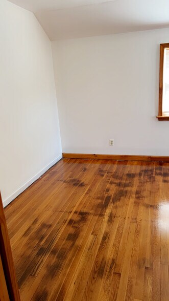 Refinished hardwood floors with original character - 557 Linden Ave