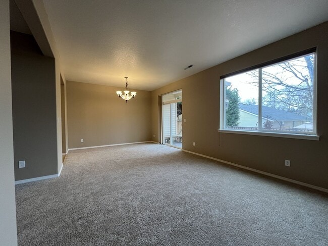 Building Photo - Inviting Two-Story 3BR Home Featuring Gas Range, Walk-In Closet, and Built-In Deck Seating